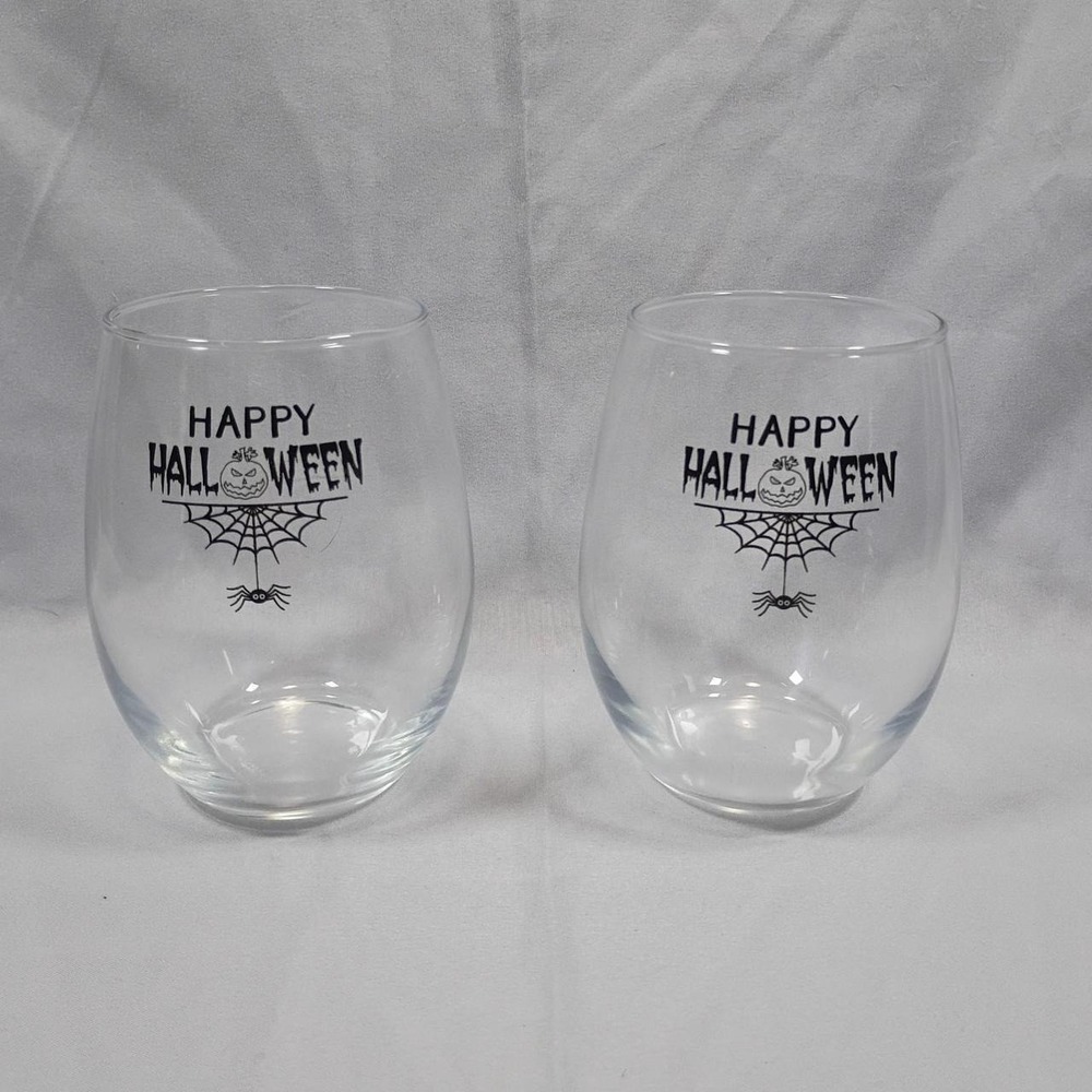 Happy Halloween stemless wine glasses with black spiderweb and spider graphic
